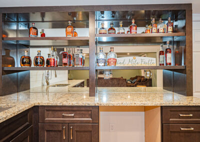 Basement bar shelves Oakton VA custom storage installation.
